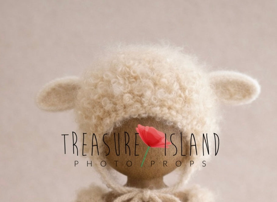 Hand knitted lamb bonnet with ears and natural curly sheep wool for newborn photography prop