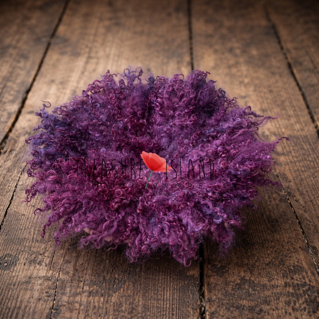 hand dyed purple curly wool newborn photography layer on rustic wooden floor, textured wool backdrop prop for baby photoshoot