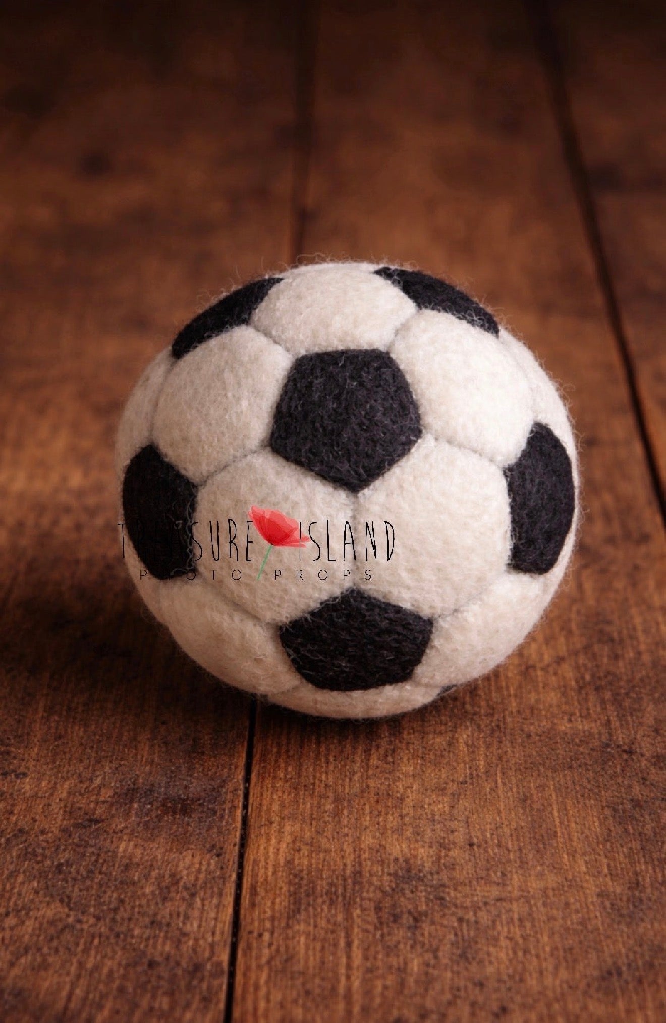 Handmade black and white felted football ball for newborn sports photography
