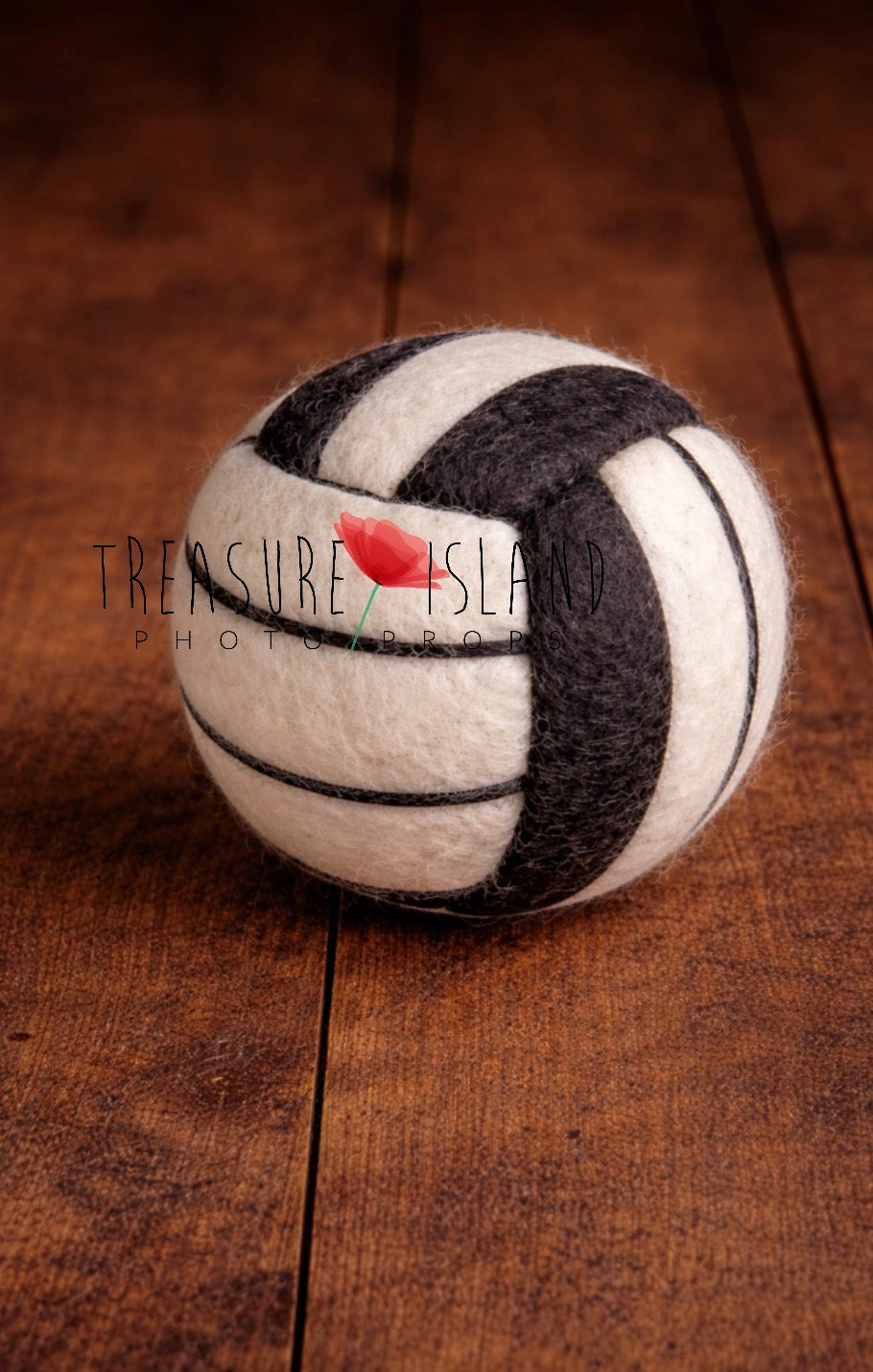 Handmade black and white felted volleyball ball for sports-themed newborn photography