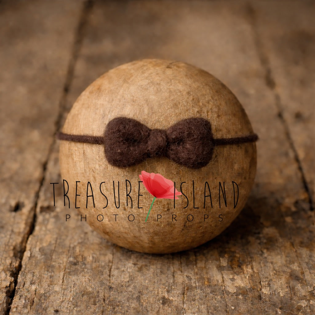 Hand-felted chocolate bow headband on wool string, newborn photography prop