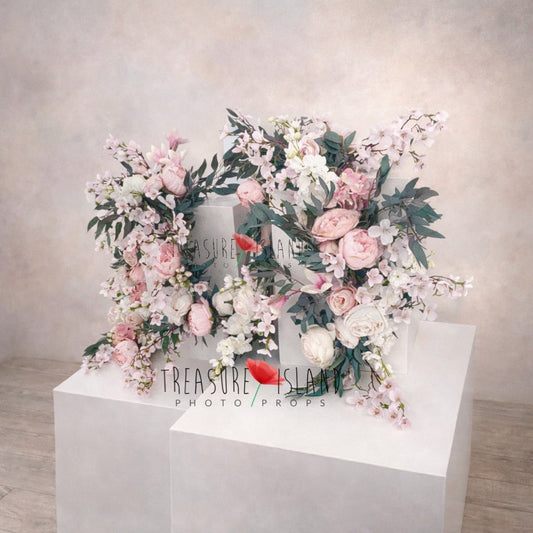 Luxury floral arrangement photography backdrop with blush peonies, cherry blossoms and cascading greenery on white pedestal cubes – studio photo prop for newborn, maternity and baby sessions