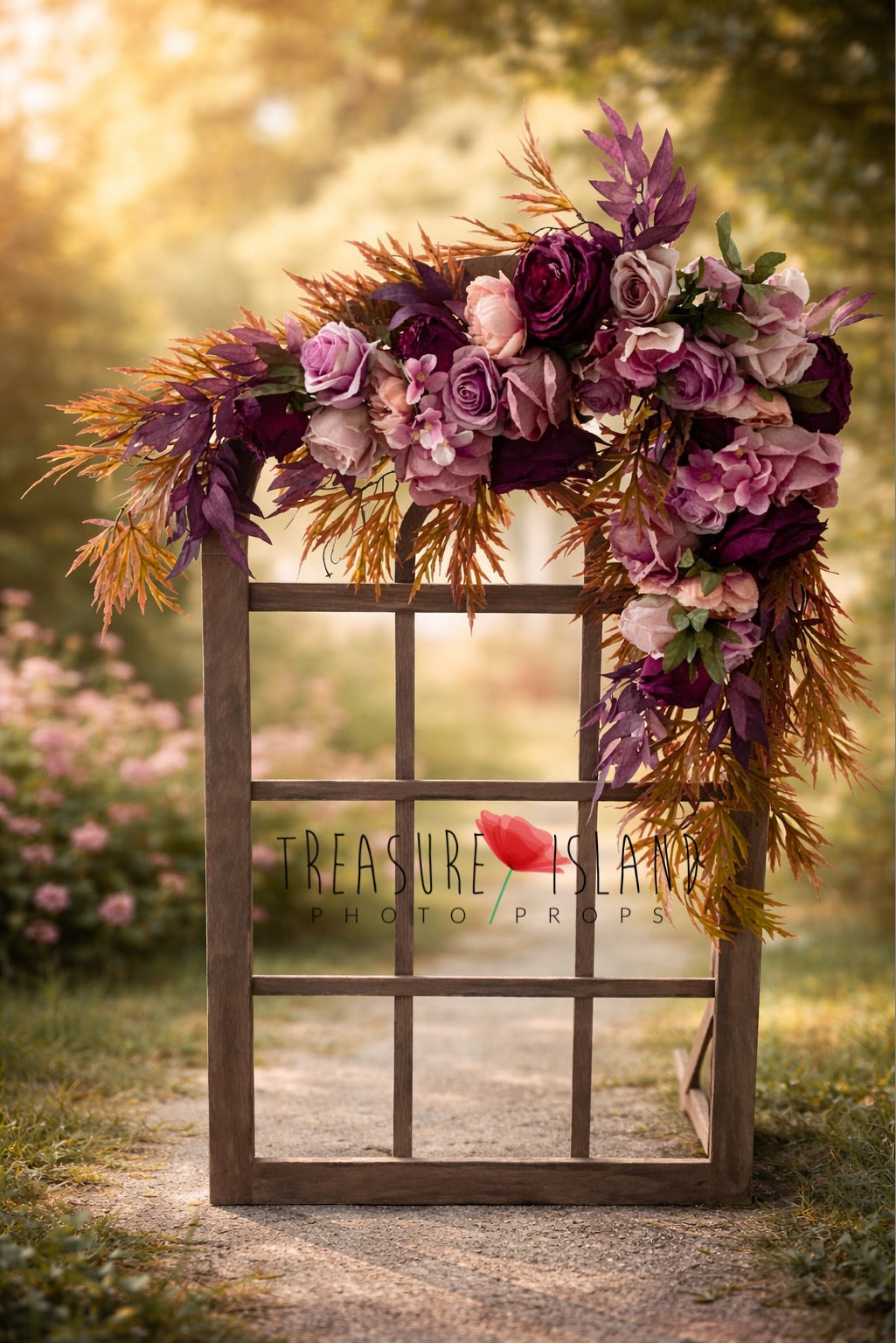 Floral newborn photography backdrop with burgundy and blush roses arranged on a rustic wooden window frame, styled against a soft garden background