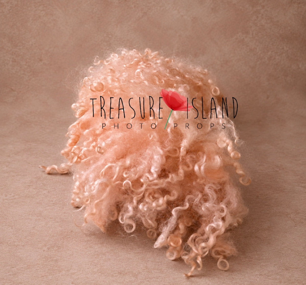 Close view of coral felted wool photography blanket showing soft natural sheep curls and handmade texture