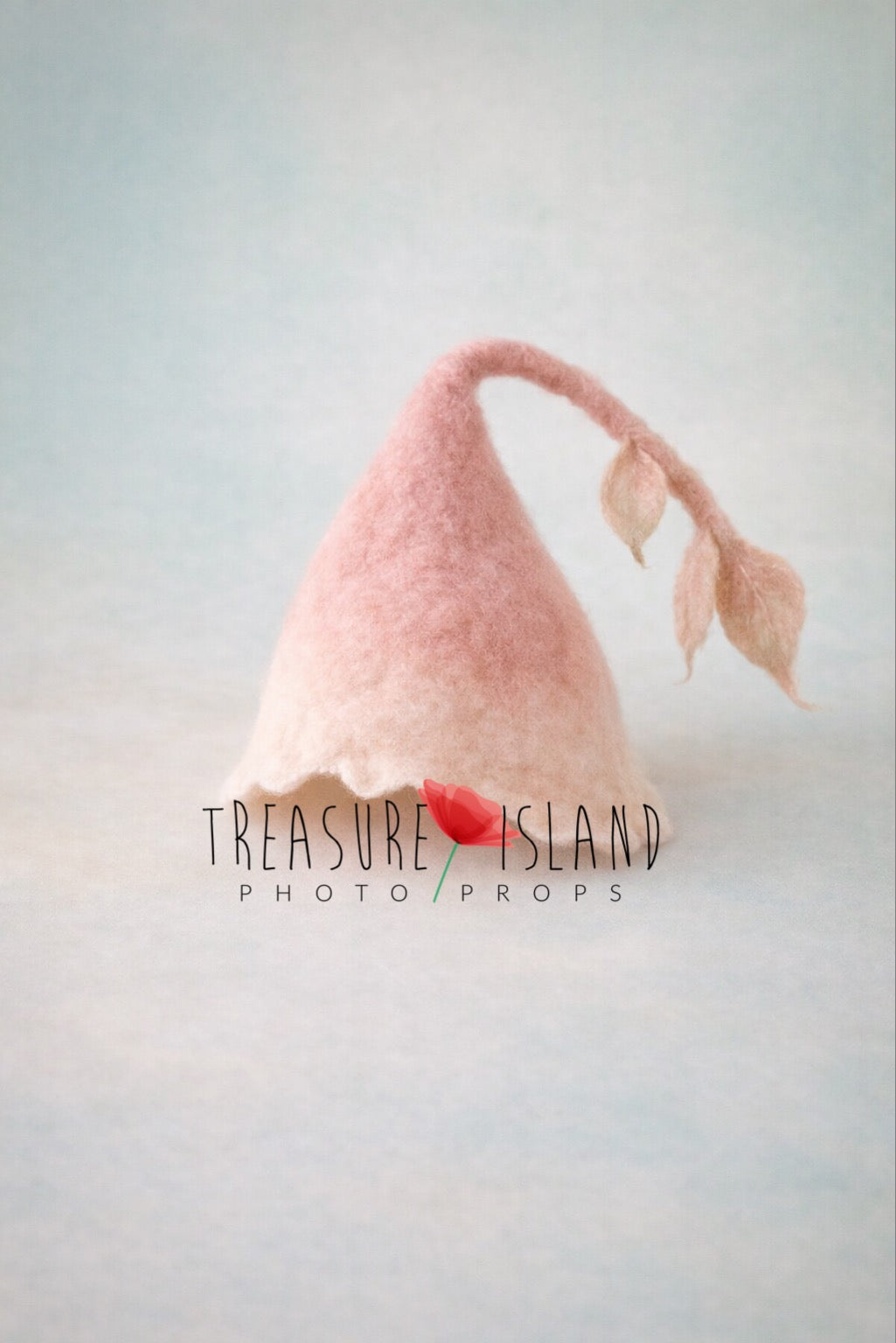 Hand felted newborn bonnet in blush and cream wool with delicate leaf stem detail, soft fairy style photo prop
