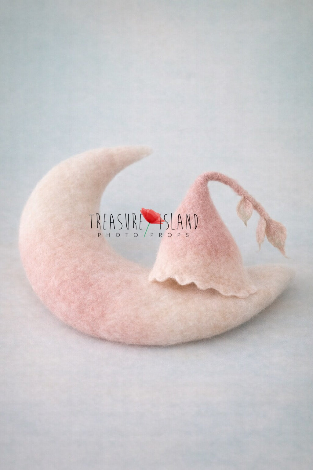 Hand felted newborn photo prop set with blush crescent moon pillow and matching wool bonnet with leaf stem

