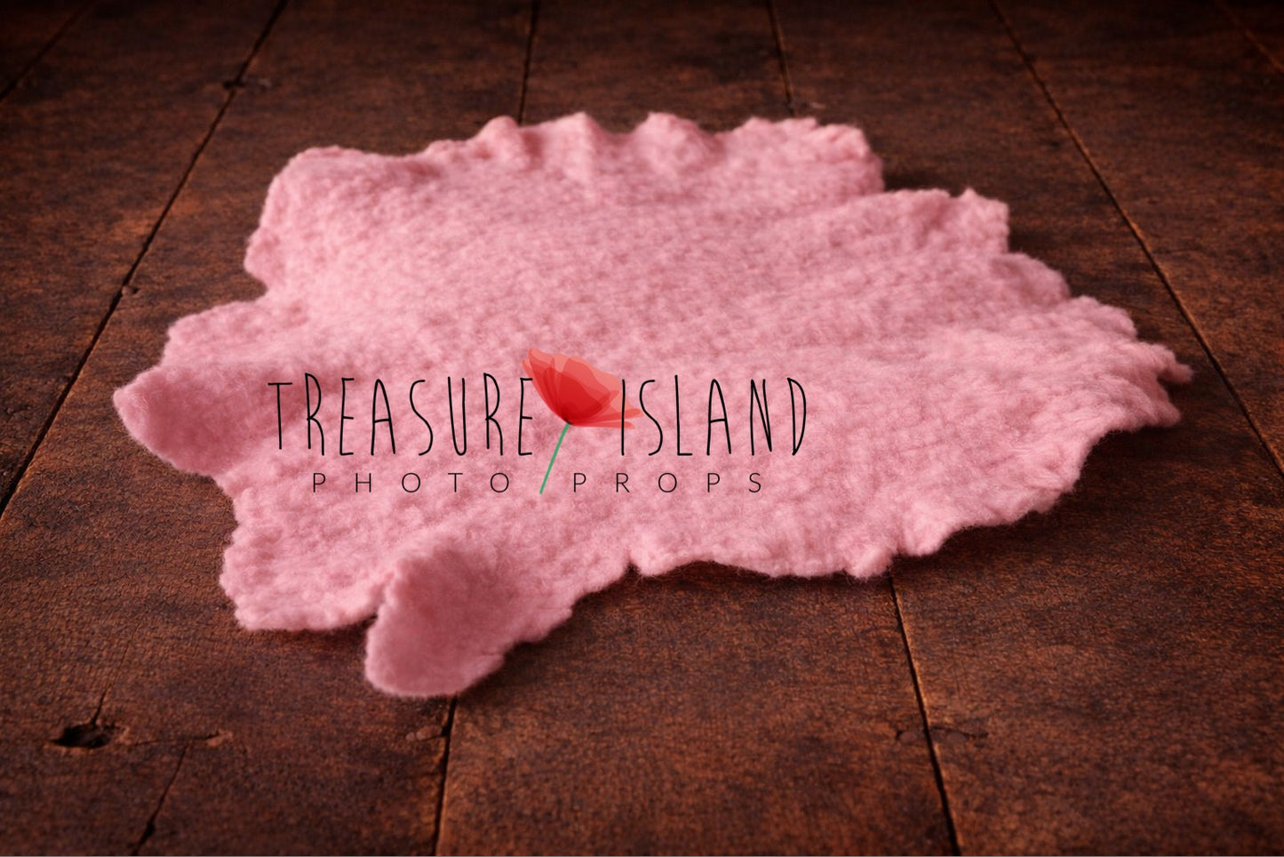 Candy pink hand-felted irregular wool blanket with organic edges