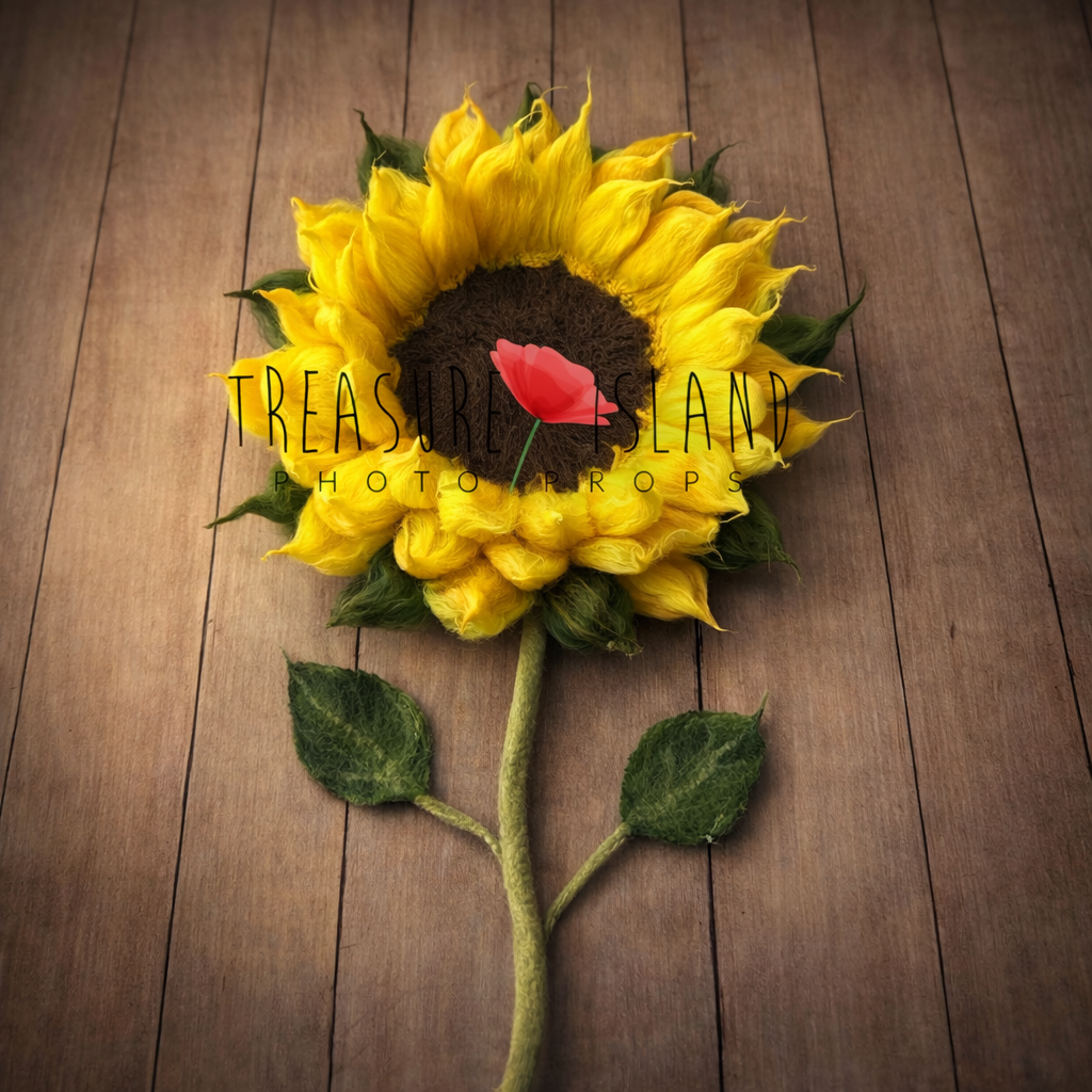Felted sunflower photography prop with long green stem and leaves