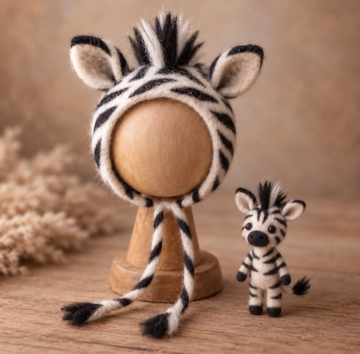 Handmade felted zebra bonnet and miniature zebra for newborn and sitter photography
