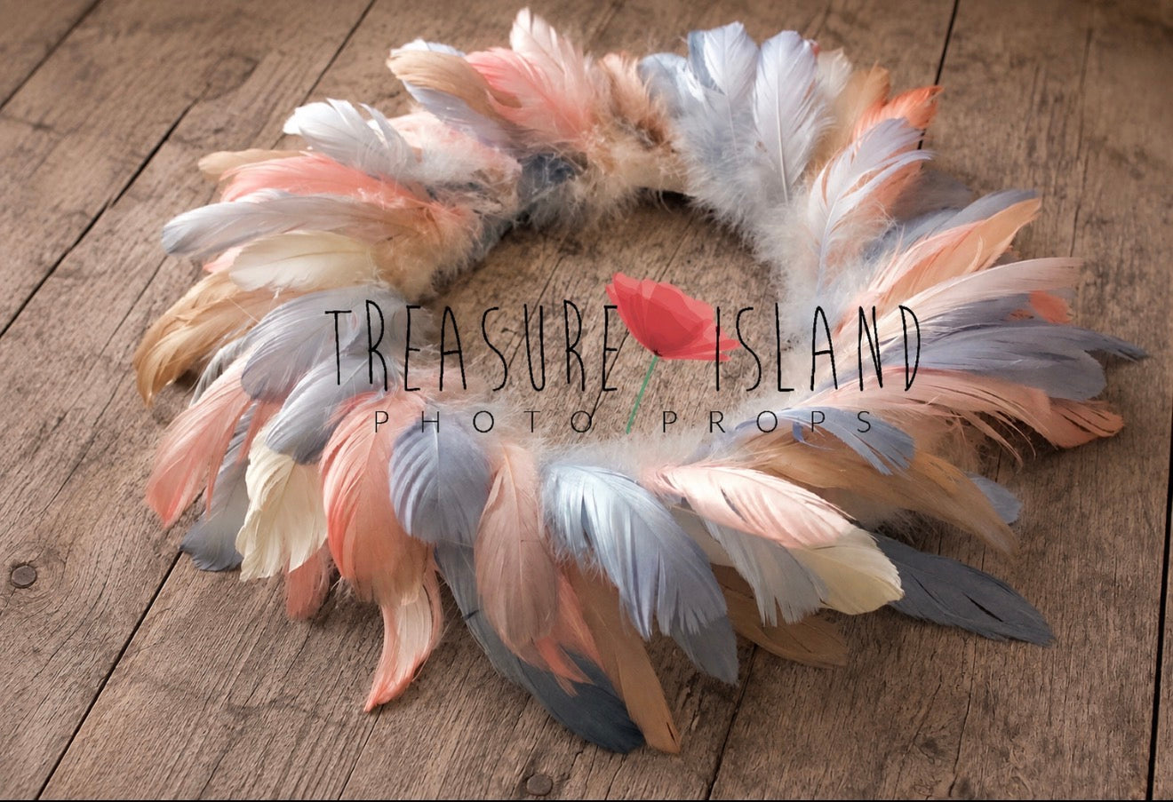 Baby blue,beige and salmin Feather Nest showing layered hand-dyed feather texture