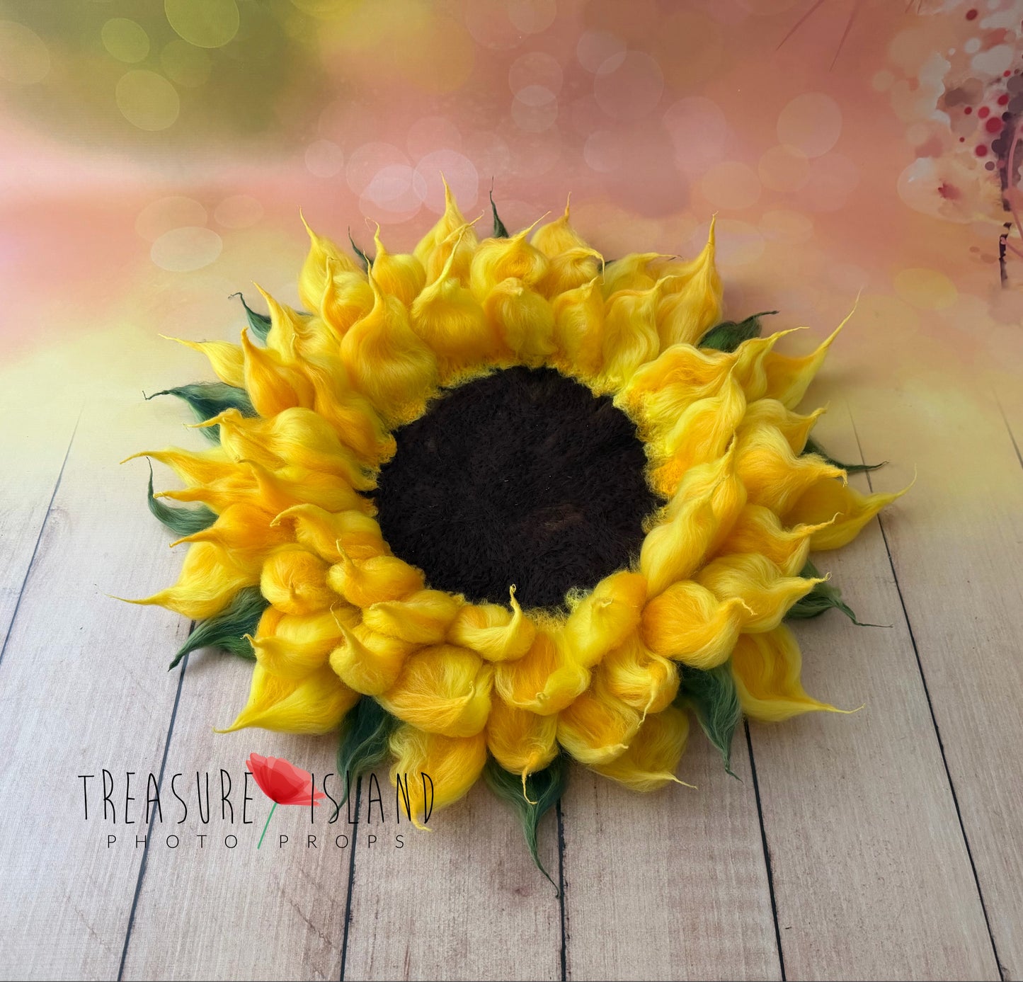 Handmade felted sunflower blanket with layered golden yellow petals