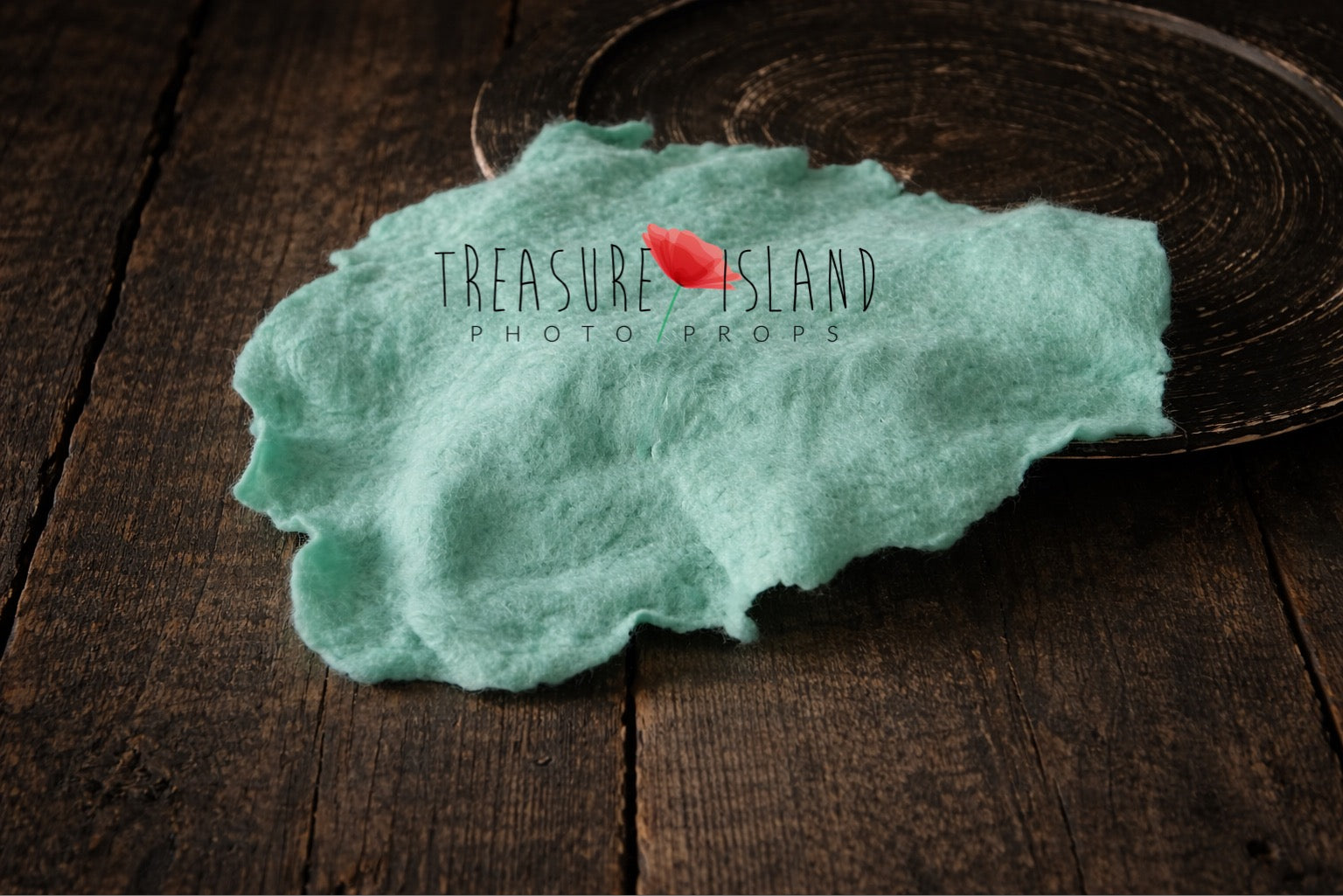 Mint hand-felted irregular wool blanket with organic edges