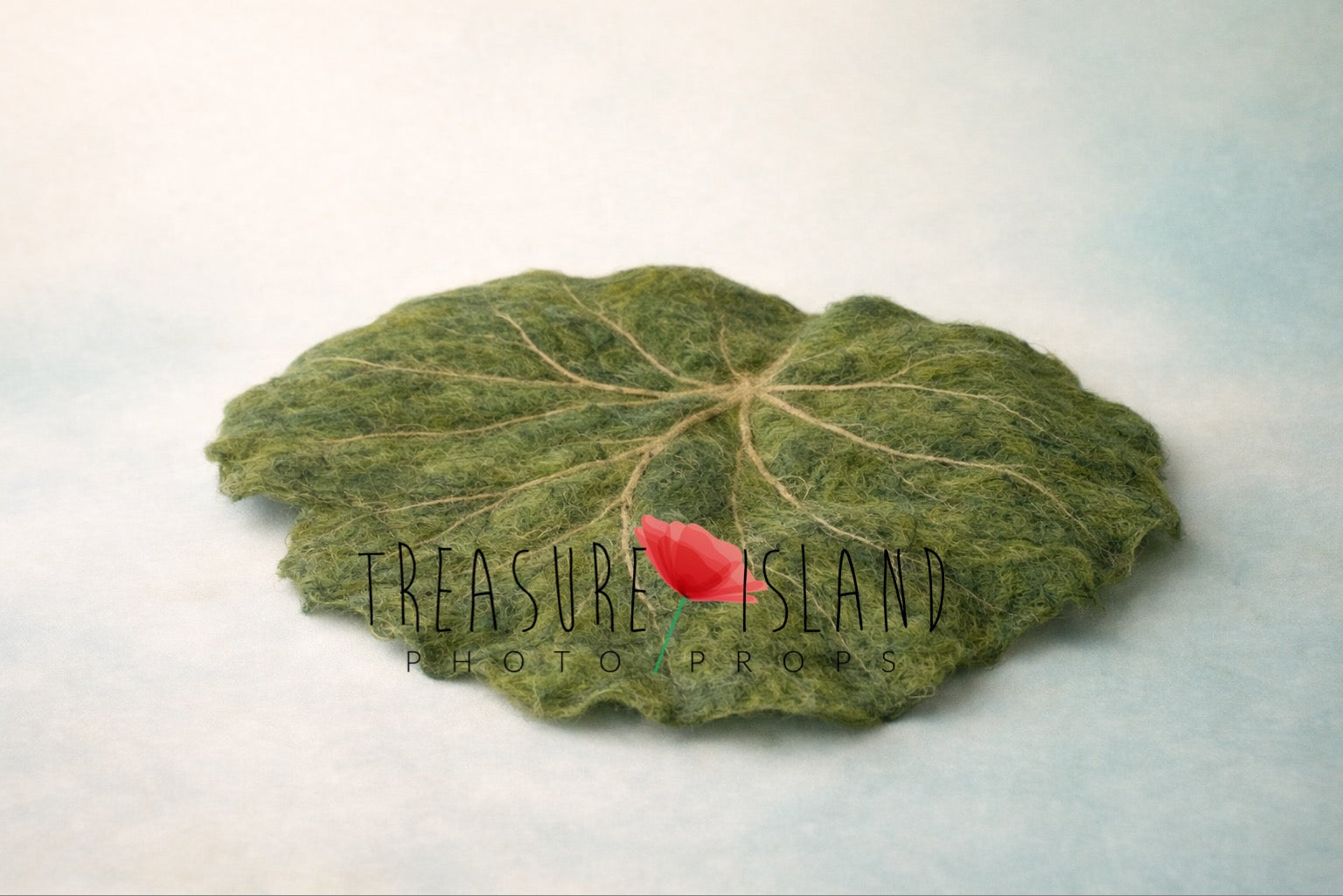 Large handmade green felted leaf photography prop with natural vein details