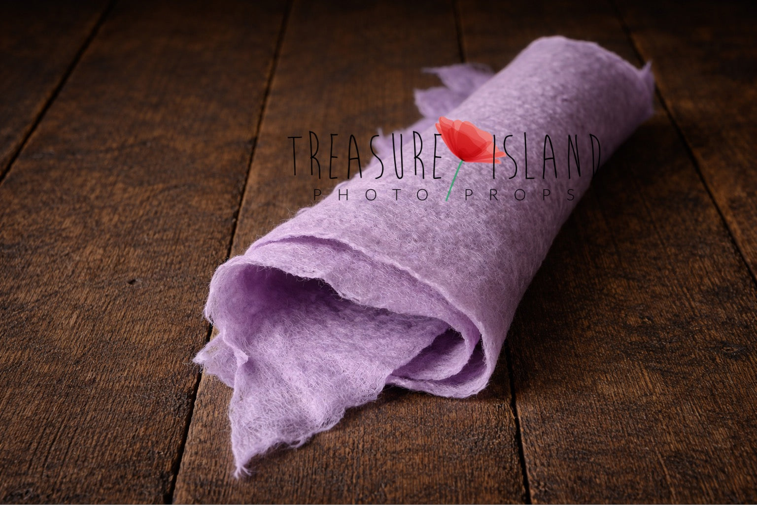 Lawender thin felted wool wrap showing handmade irregular edges