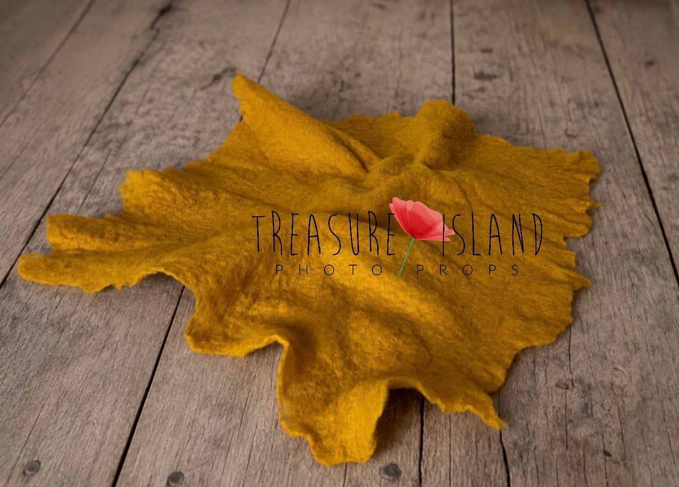 Mustard hand-felted irregular wool blanket with organic edges
