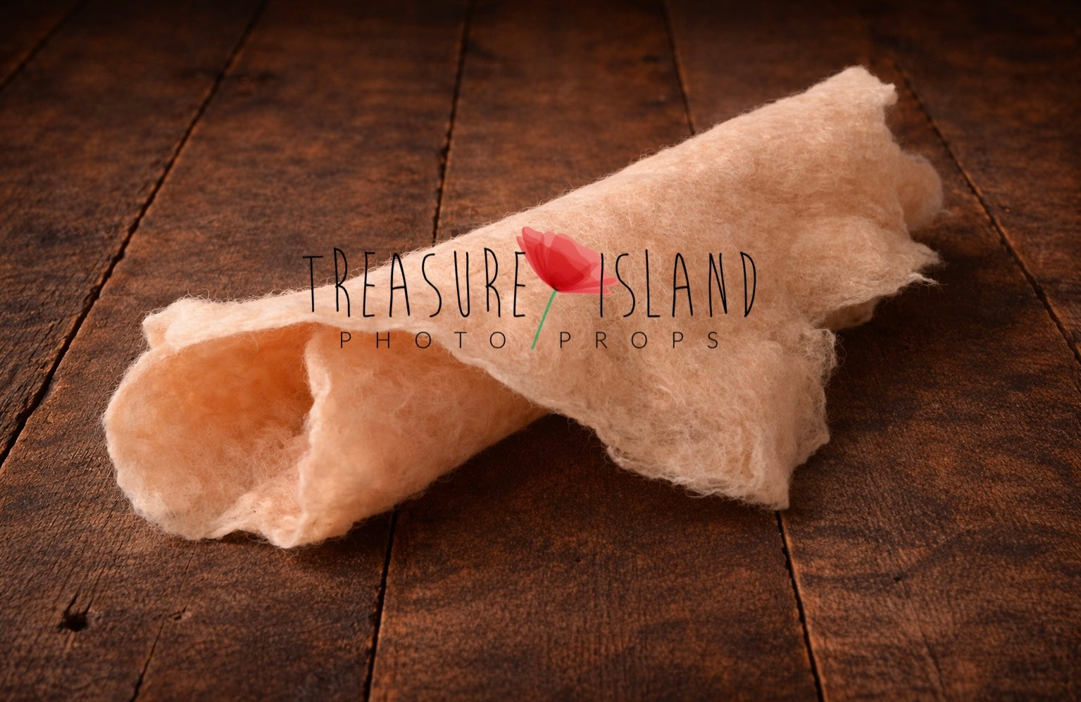Rolled skin hand-felted wool photography blanket showing soft felt texture