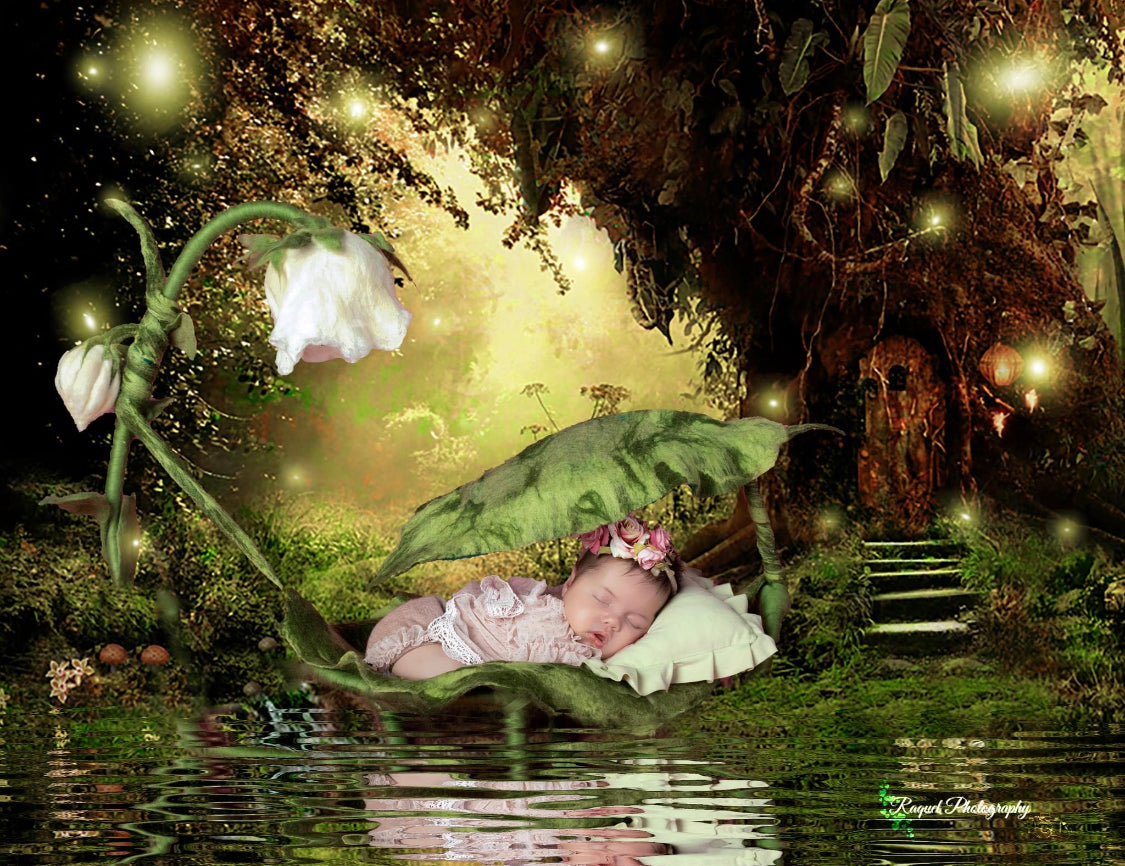 Newborn posed in Thumbelina felted leaf hammock with sculptural flower