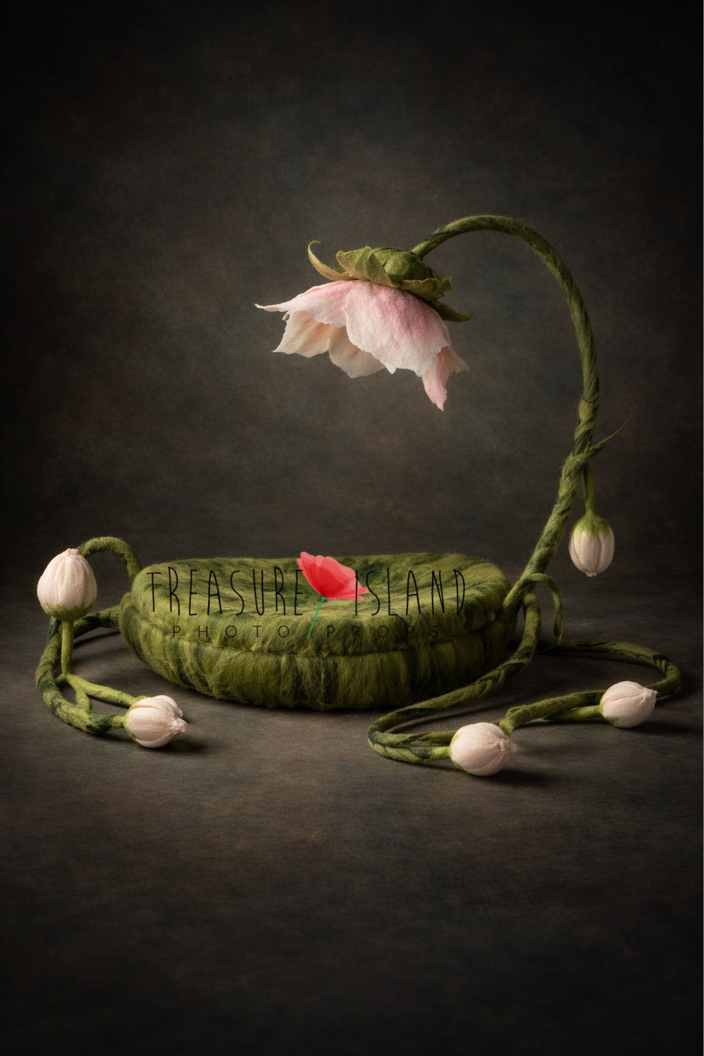 Thumbelina newborn photography prop shown with long felted flower vine
