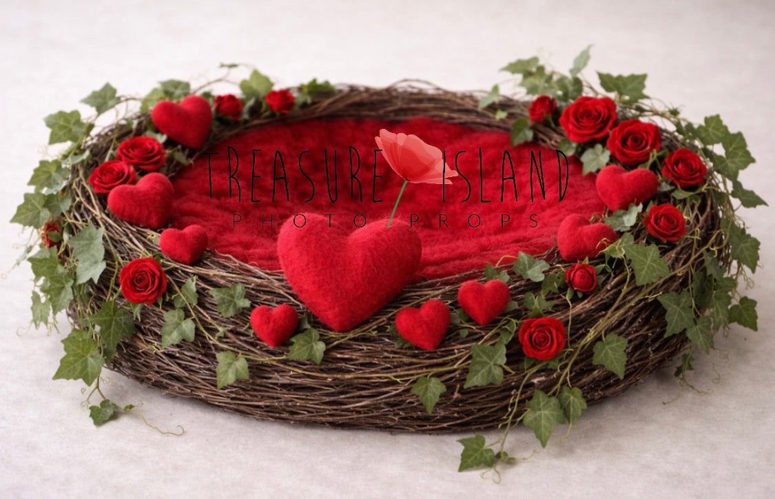 Valentine newborn photography nest decorated with red roses, ivy and felted hearts