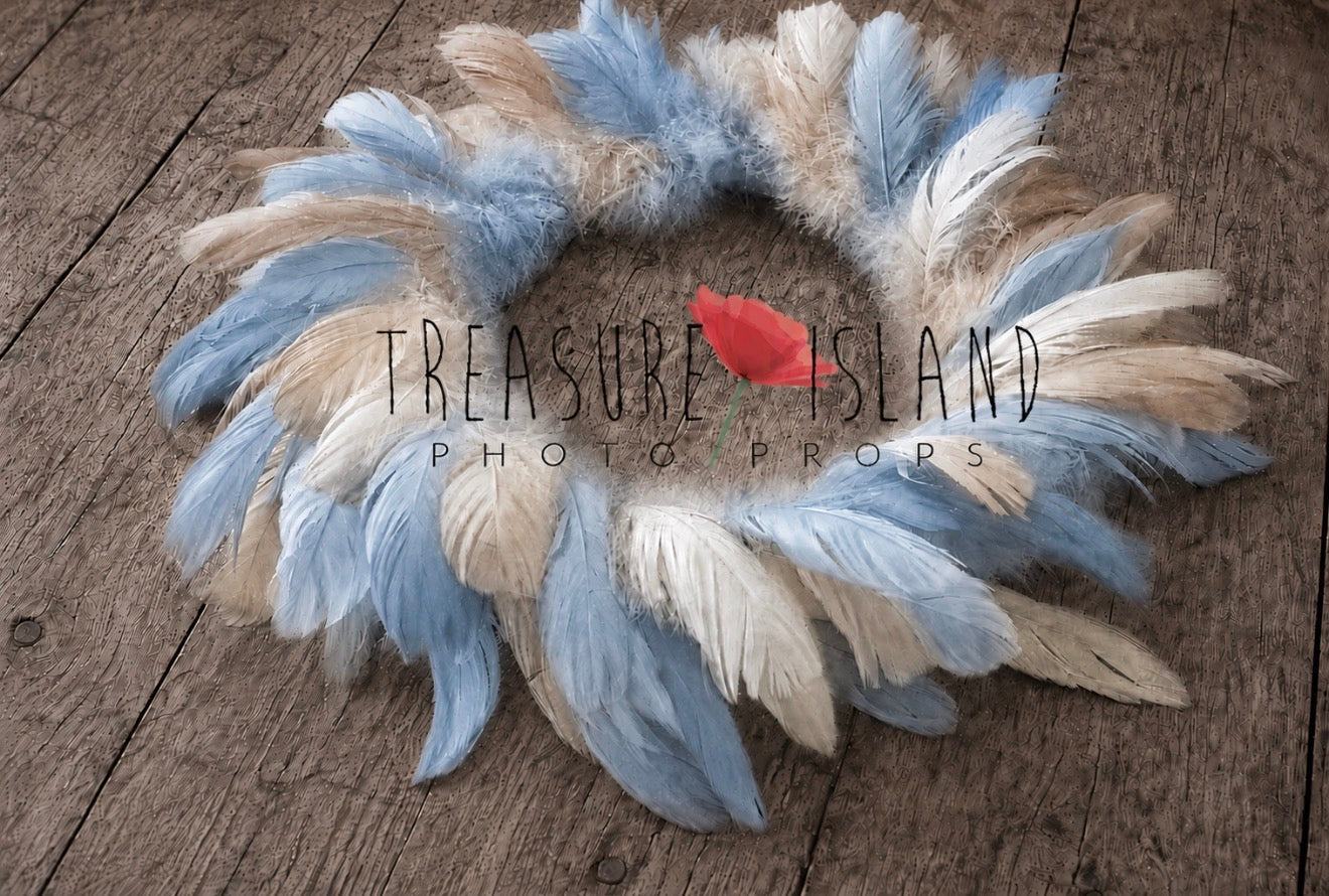 Baby blue and beige Feather Nest showing layered hand-dyed feather texture