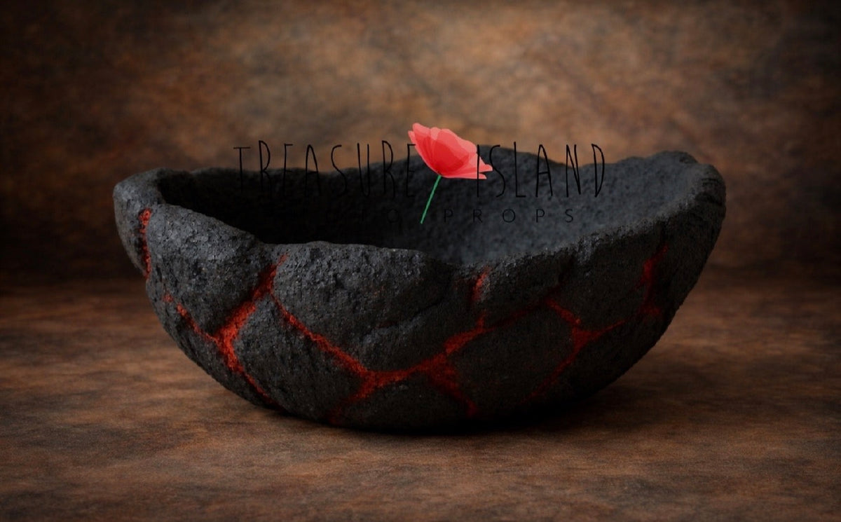 Black handmade styrofoam Volcanic Bowl with lava-red details for dragon newborn photography