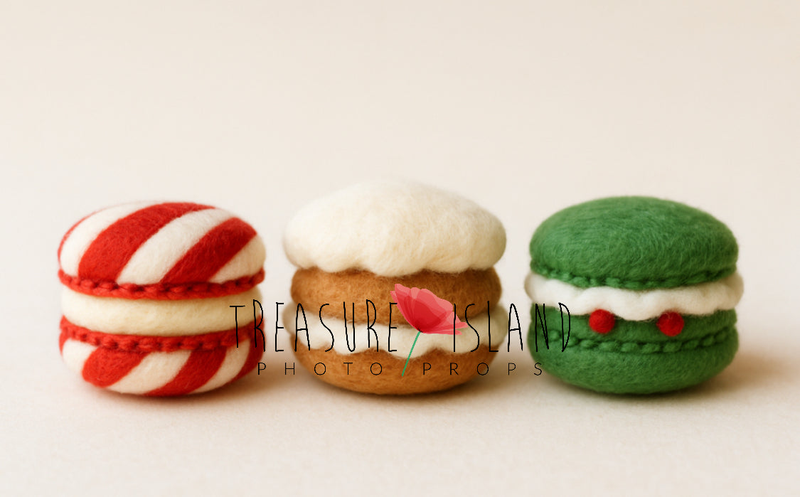 Three hand-felted Christmas macaron photography props in candy cane, gingerbread and festive green designs