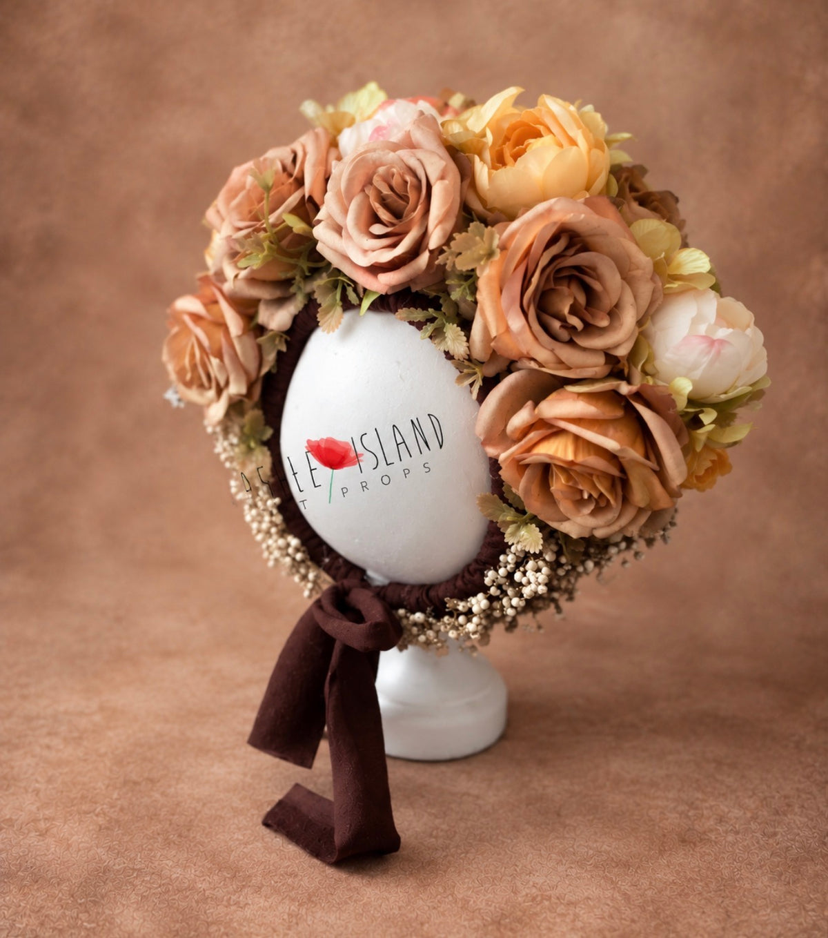 Handmade floral photography bonnet with caramel roses and warm botanical details