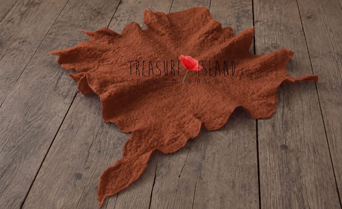 Cinnamon hand-felted irregular wool blanket with organic sculpted edges for newborn photography