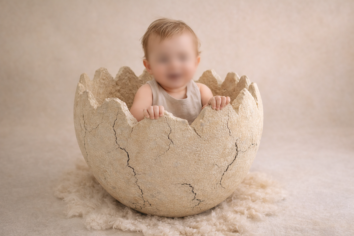 Dinosaur Eggshell used as a prehistoric sitter photography prop