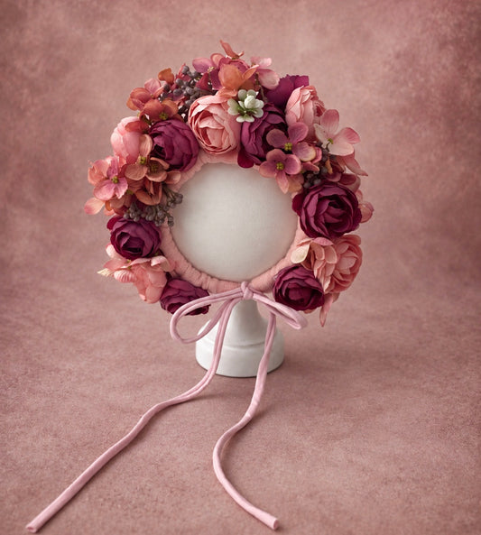 Dusty rose and berry floral bonnet with layered artificial flowers for newborn and sitter photography