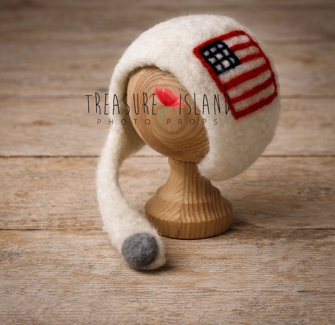 White hand-felted newborn aviator bonnet with American flag detail