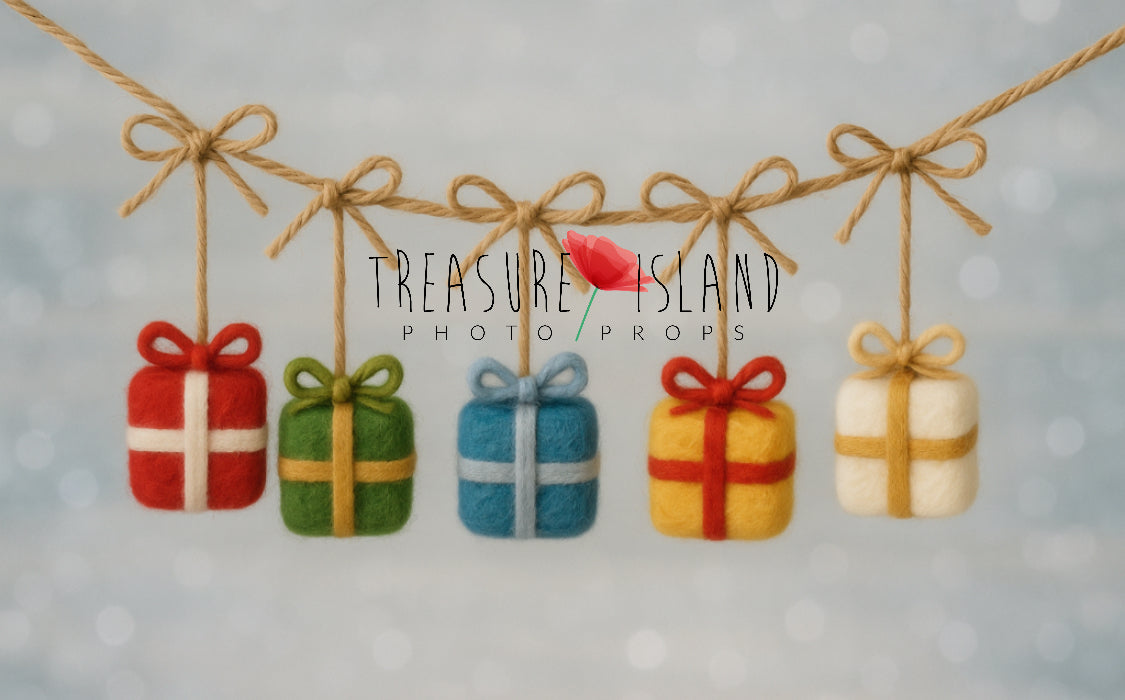 Hand-felted Christmas gift garland with five colorful merino wool presents on jute cord