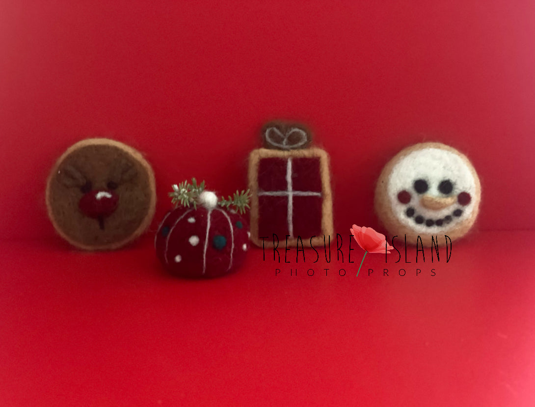 Handmade felted Christmas mini props with round holiday cookie, snowman cookie, cupcake and Christmas present for newborn and sitter photography.