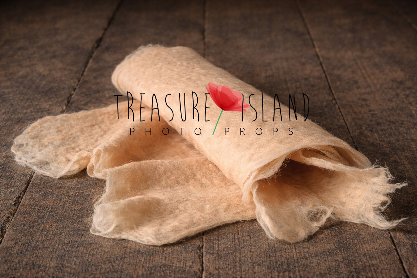 Skin thin felted wool wrap showing handmade irregular edges