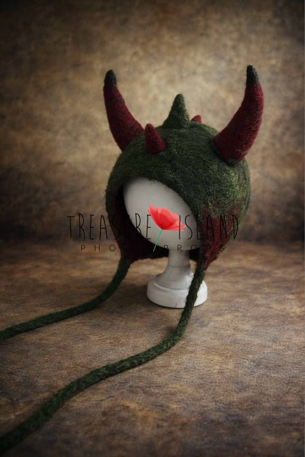 Forest green hand-felted dragon bonnet with burgundy horns for newborn and sitter photography
