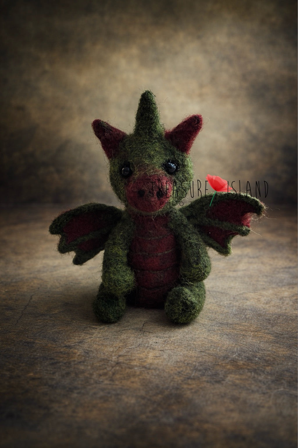 Hand-felted forest green dragon toy with burgundy wings for fantasy newborn photography