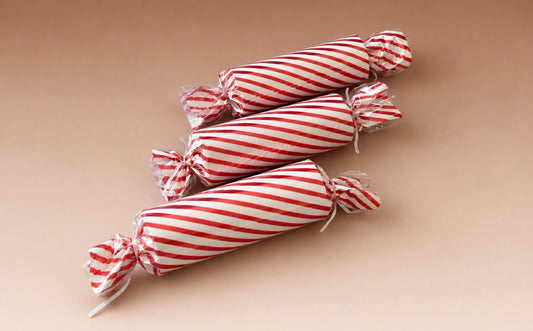 Giant red and white candy sweets for Candyland Christmas photography setups