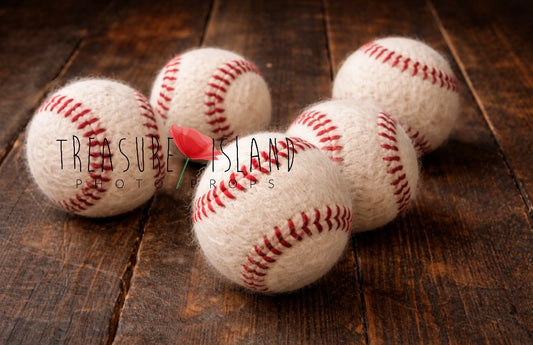 Hand-felted white baseball balls with raised red stitching for newborn and sitter sports photography