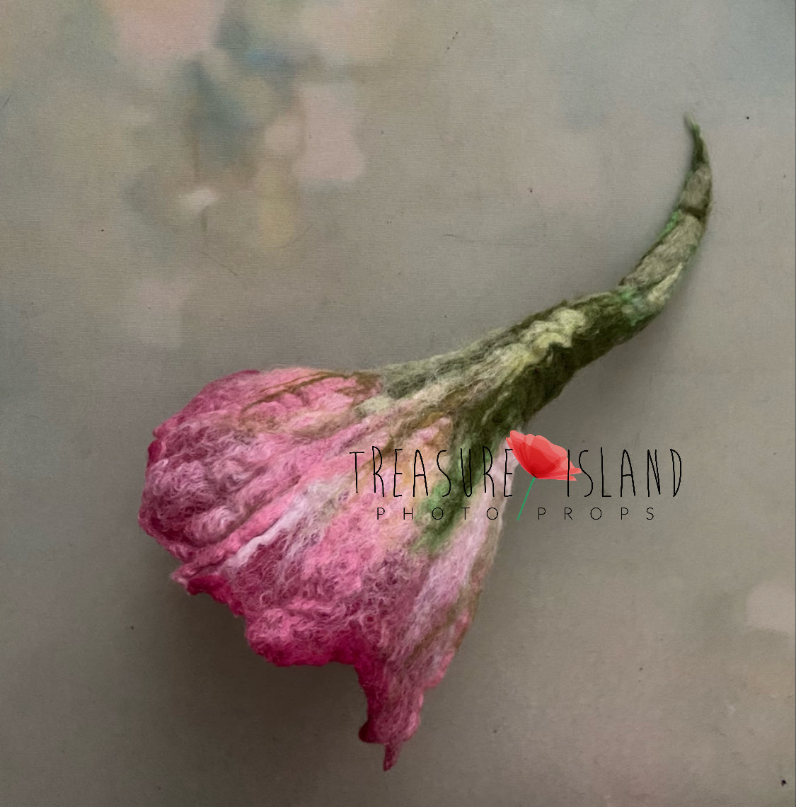 Hand-felted pink flower bonnet with sculptural green stem