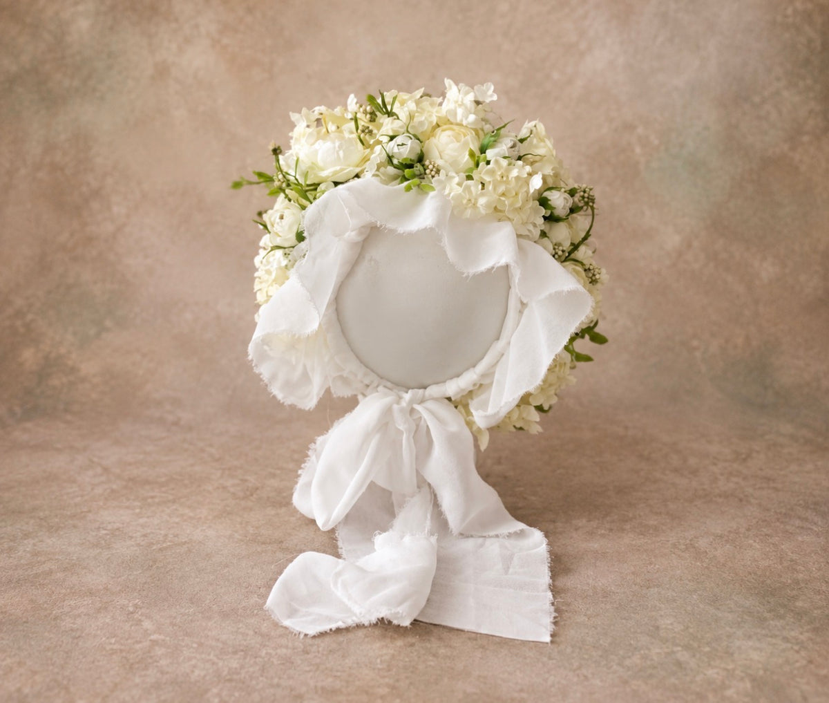 Ivory Garden floral bonnet with creamy white artificial flowers and flowing fabric ties for newborn and sitter photography