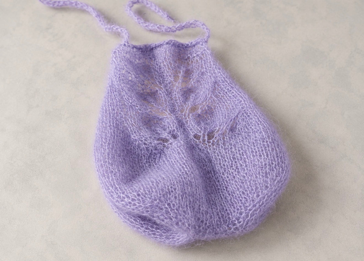 Lavender hand-knitted openwork baby photography outfit with delicate neckline ties