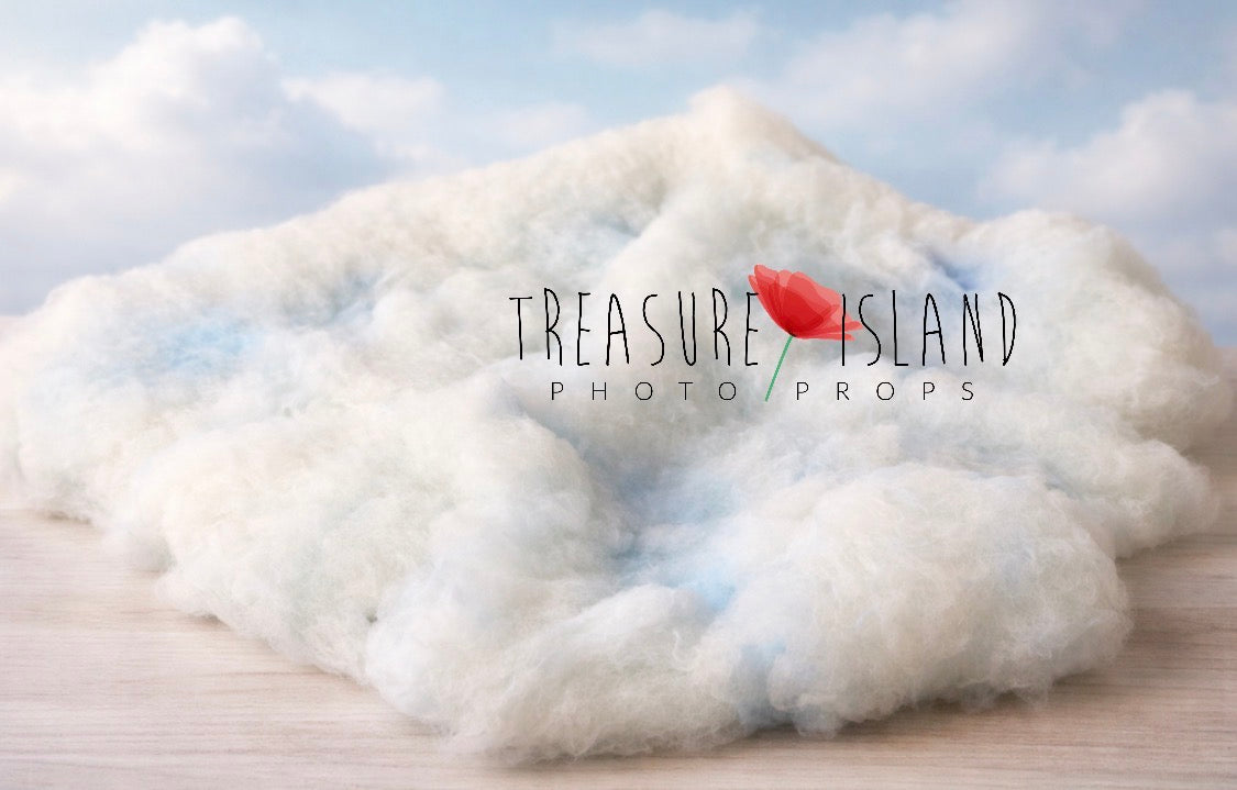White and soft blue hand-felted merino wool cloud layer with fluffy organic texture