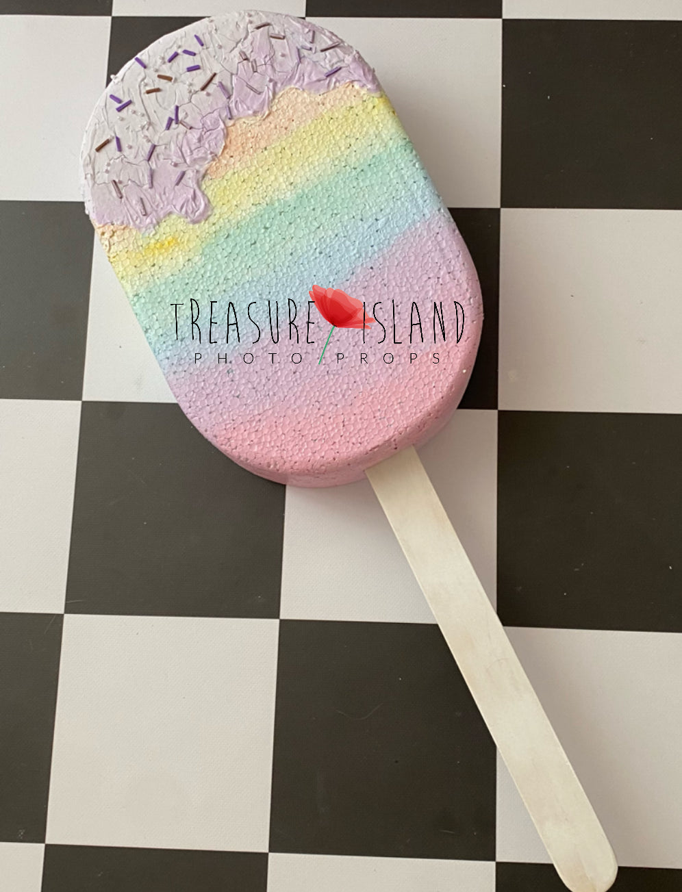 Hand-painted pastel rainbow styrofoam ice cream prop with dripping glaze, sprinkles and wooden stick