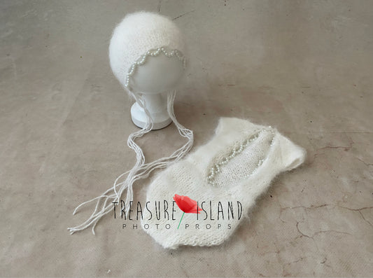 White angora romper and matching bonnet with pearl details for newborn photography