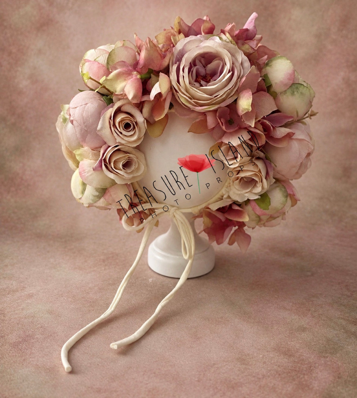 Handmade blush floral bonnet showing layered roses and botanical details for fine art photography