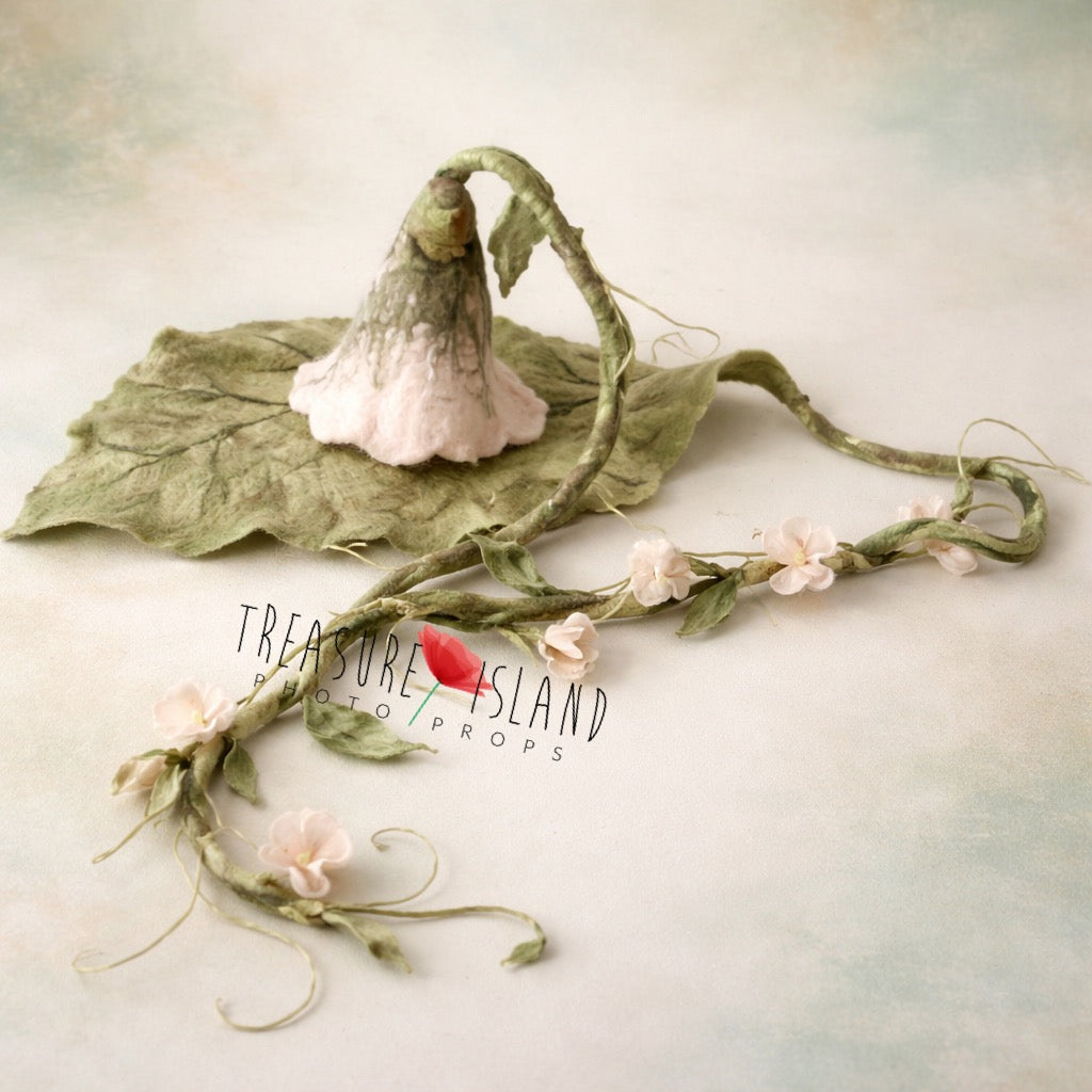 Hand-felted Sweet Pea newborn bonnet with sculpted wool petals and botanical details