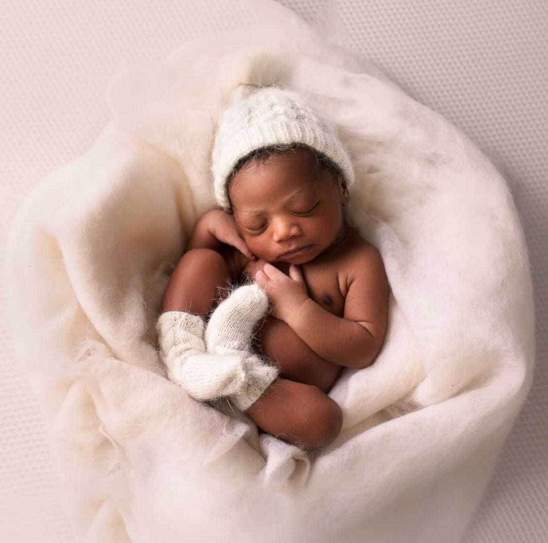 Extra long felted wool wrap used for newborn photography styling