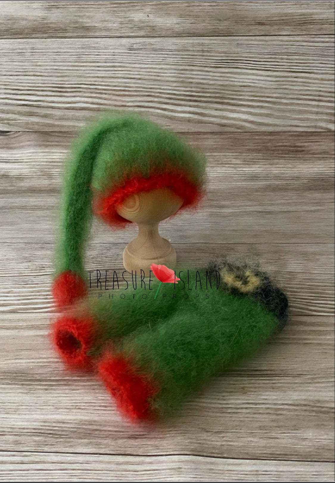 Handmade green Elf outfit and long-tailed pixie hat in fluffy alpaca-rich yarn with red Christmas accents