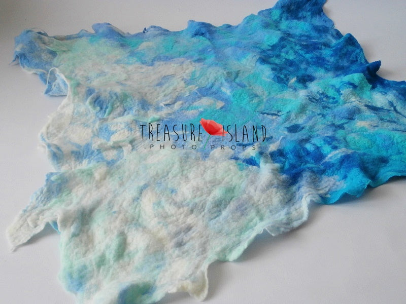 Handmade felted wool Ocean Wave blanket with seafoam, aqua, turquoise and deep blue transitions